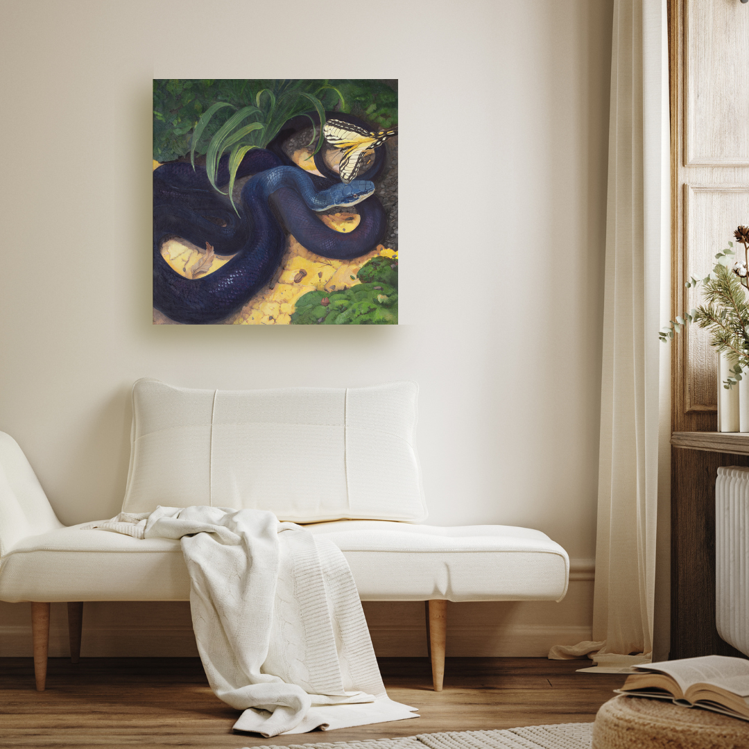 A painting of a black rat snake and a yellow swallowtail butterfly hanging on a white wall in a cozy modern living room.