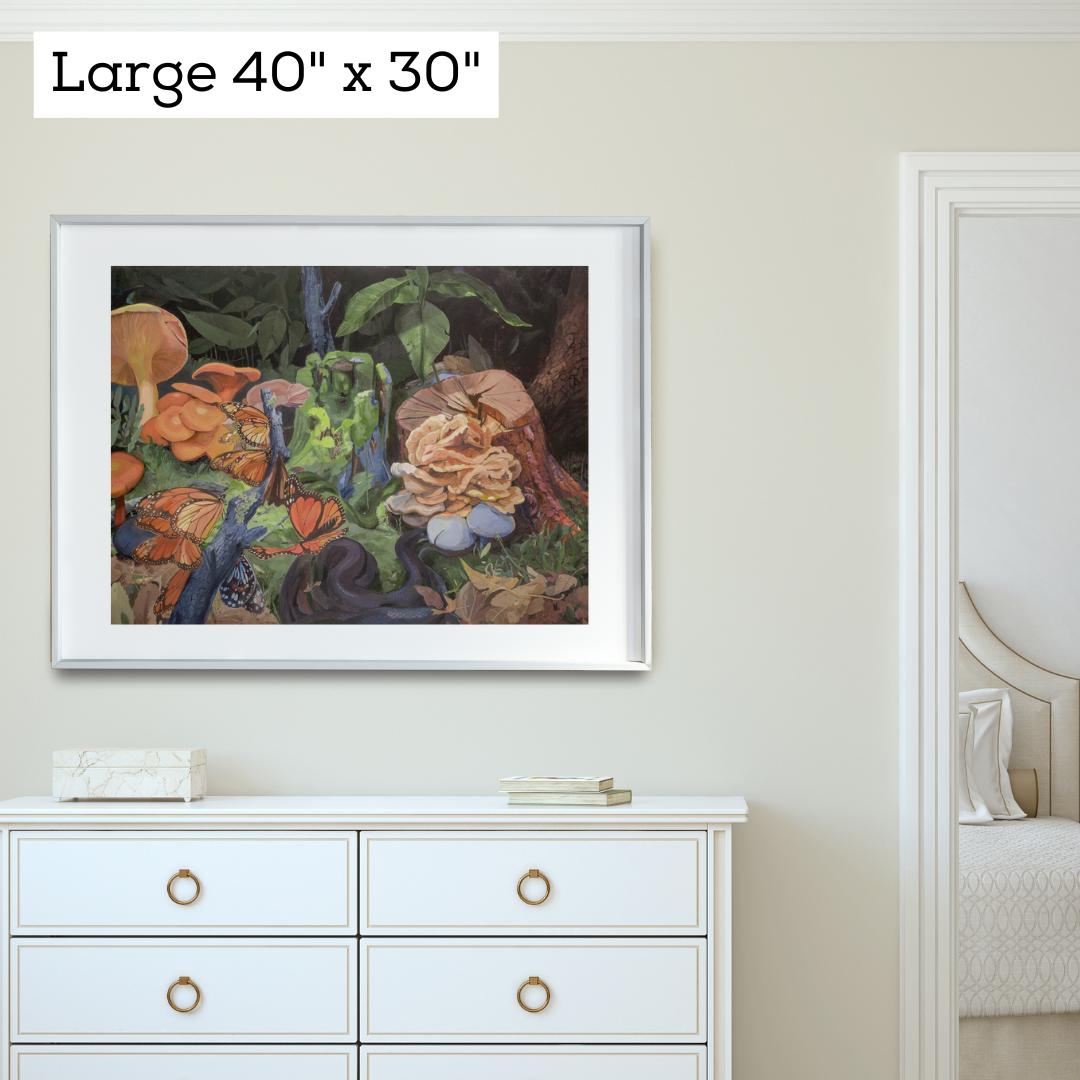 An art print featuring a forest floor scene in a white frame against a white wall in a traditional style bedroom.